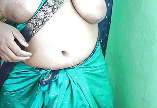 Indian Kinky mommy Striping in Green sharee And Displaying her Puss Close up